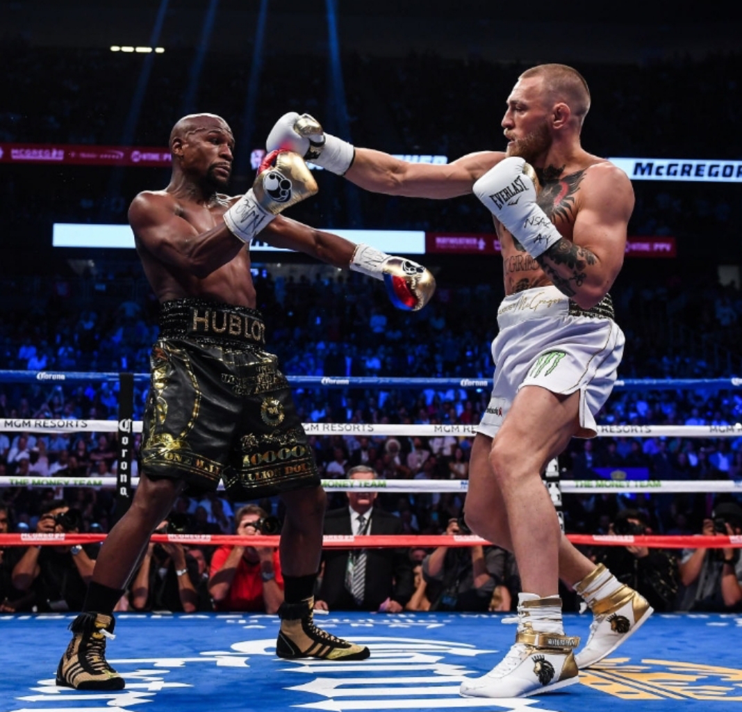 FLOYD MAYWEATHER AND CONNOR MCGREGOR OPENS TALKS FOR A WORLD RECORD DEAL BOXING  IN UFC